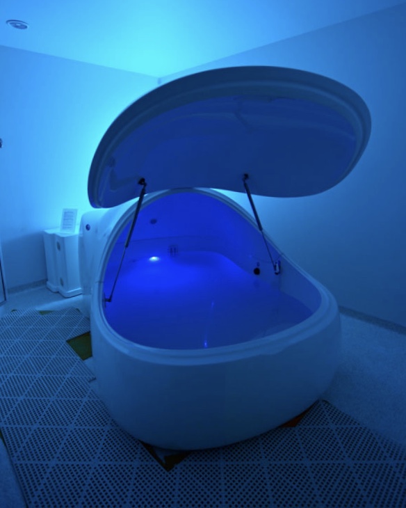 An open i-sopod in a private blue-lit Float Spot room, from the studio archive